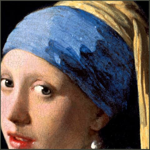 Vermeer's Girl with a Pearl Earring, the head turned over the shoulder under a wound blue turban.